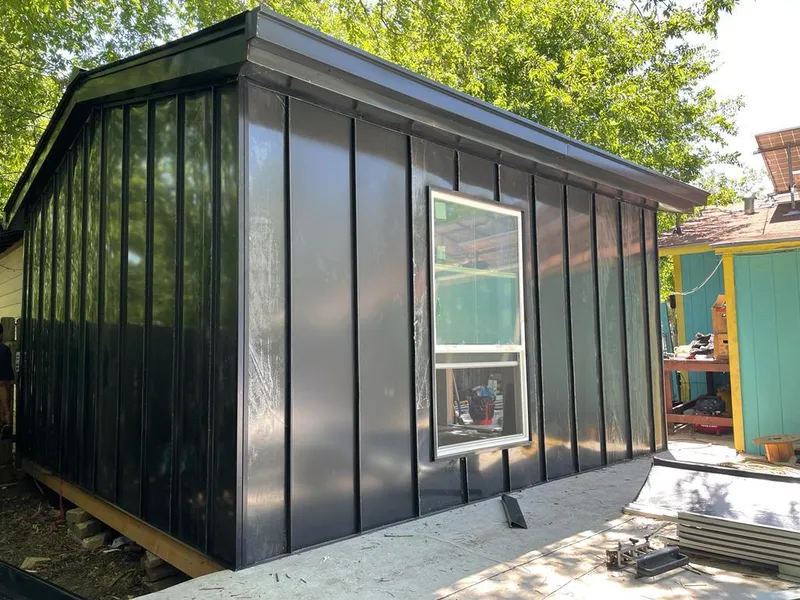 Black standing seam metal wall panels for Metal Roof Installation in Merrifield