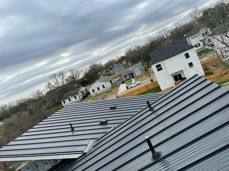 Standing seam metal roof panels with vents for Skylight Repair in Merrifield